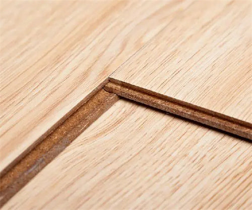 Choosing Between Composite and Solid Wood Flooring: A Detailed Comparison